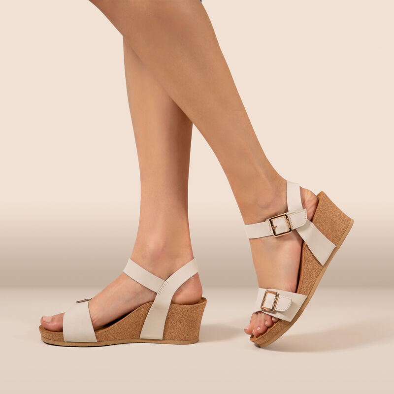 ivory quarter strap wedge on foot